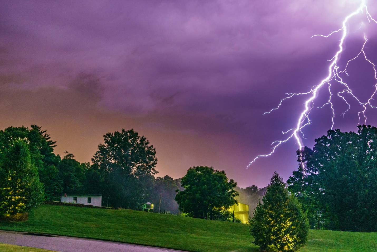 Lighting strike near trees